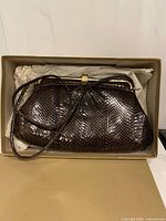 Handbag inside original box, exterior view