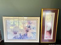 Both framed prints side by side