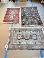 All three rugs displayed together for scale and variety