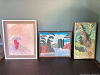 Group shot of three framed JAW Chomyn paintings