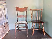 Both chairs side by side showing overall styles and condition