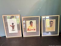 Group view of three of the four framed watercolours