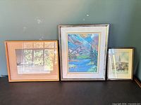 Group shot of all three framed artworks upright