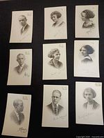 Nine portrait postcards laid out on black background