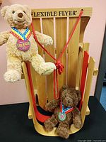 overview showing both Wish Bear plush toys and Flexible Flyer sled