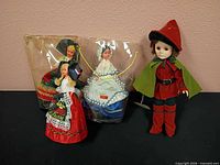Group shot showing all four dolls