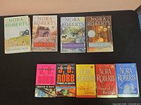 All ten books laid out, covers visible