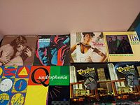 All eight album jackets laid out
