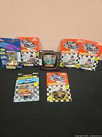 Group shot of all seven sealed Racing Champions NASCAR cars