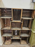 Front view of stacked wooden crates forming shelving