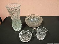 Group shot of vase, large bowl, small bowl, creamer