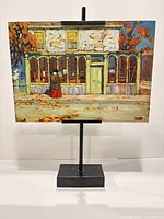 Full view of textured lithograph panel on display stand