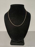 Necklace displayed on bust