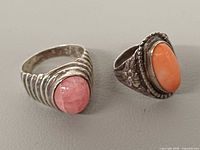 Front view of both sterling silver rings showing stones and design details