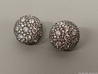 Front view of both domed rhinestone earrings