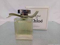 Bottle and box front view