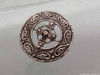 Front view of sterling silver Celtic brooch