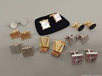 Group shot of all eight cufflink pairs
