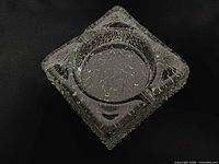 top angled view showing square form and circular bowl