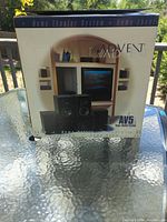 Front of Advent AV5 retail box on table outdoors