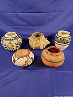 Group shot of five pots showing sizes and designs