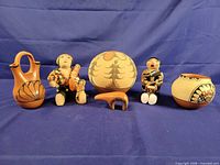 front view showing all six pottery pieces