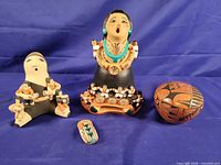 Group shot showing all four pottery items