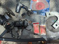 Overall lot with sander, drill, sanding sponges, diamond blade, air dryer bracket