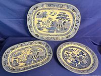 Group shot of three platters showing shapes and pattern