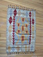 Full view of Southwestern kilim rug with fringe