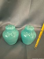 turquoise ceramic rabbit-form shaker pair