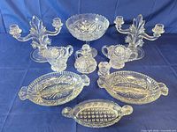 Group shot of all glass pieces against blue background