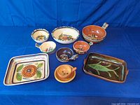 Group shot of all nine pottery pieces