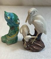Both bird figurines front view