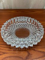 Top view showing round diamond-cut crystal ashtray