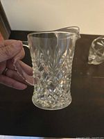 Overall view of clear glass creamer pitcher showing Pineapple diamond pattern and handle