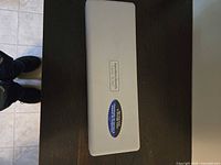 Closed plastic case labeled Hamilton Beach Electric Carving Set