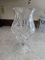 assembled crystal hurricane candle holder on counter