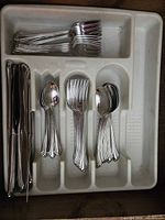 Top-down view showing entire flatware set in organizer