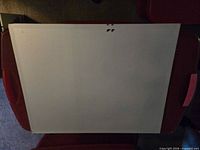 Front reflective side of rectangular mirror