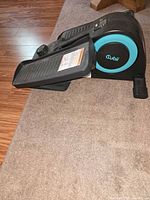 Right side view showing aqua accent and one pedal