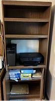 Front view of bookcase showing shelves, cabinet doors, and overall finish