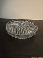 overview of shallow cut glass bowl showing diamond lattice pattern