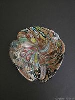 Top view showing multicolor tutti frutti pattern and free-form shape