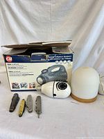 Full lot with diffuser, four pocket knives, CHI inflator unit and box