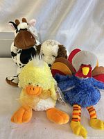 Group shot of all four Ty plush animals