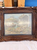 Front view showing entire framed seascape print and ornate frame