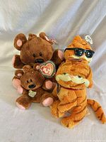 Group shot of all four Ty plush toys