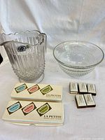 Group shot showing pitcher, bowl, two match boxes, five match holders