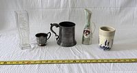 group shot of all five items with measuring tape for scale